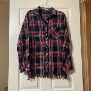 Tunic length oversized plaid/ flannel with fringe details at the hem